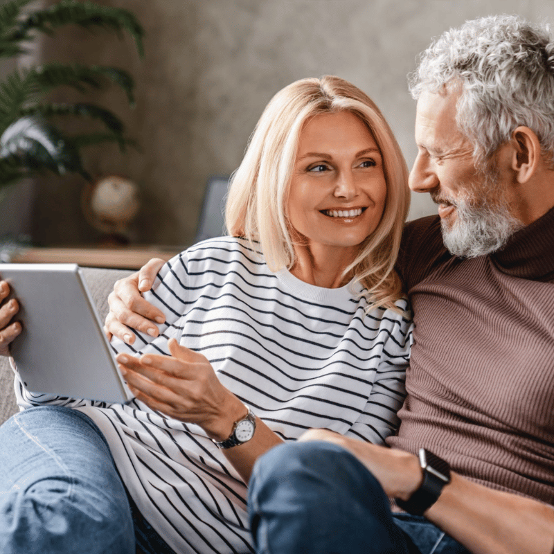 Happy Mature Couple on Tablet